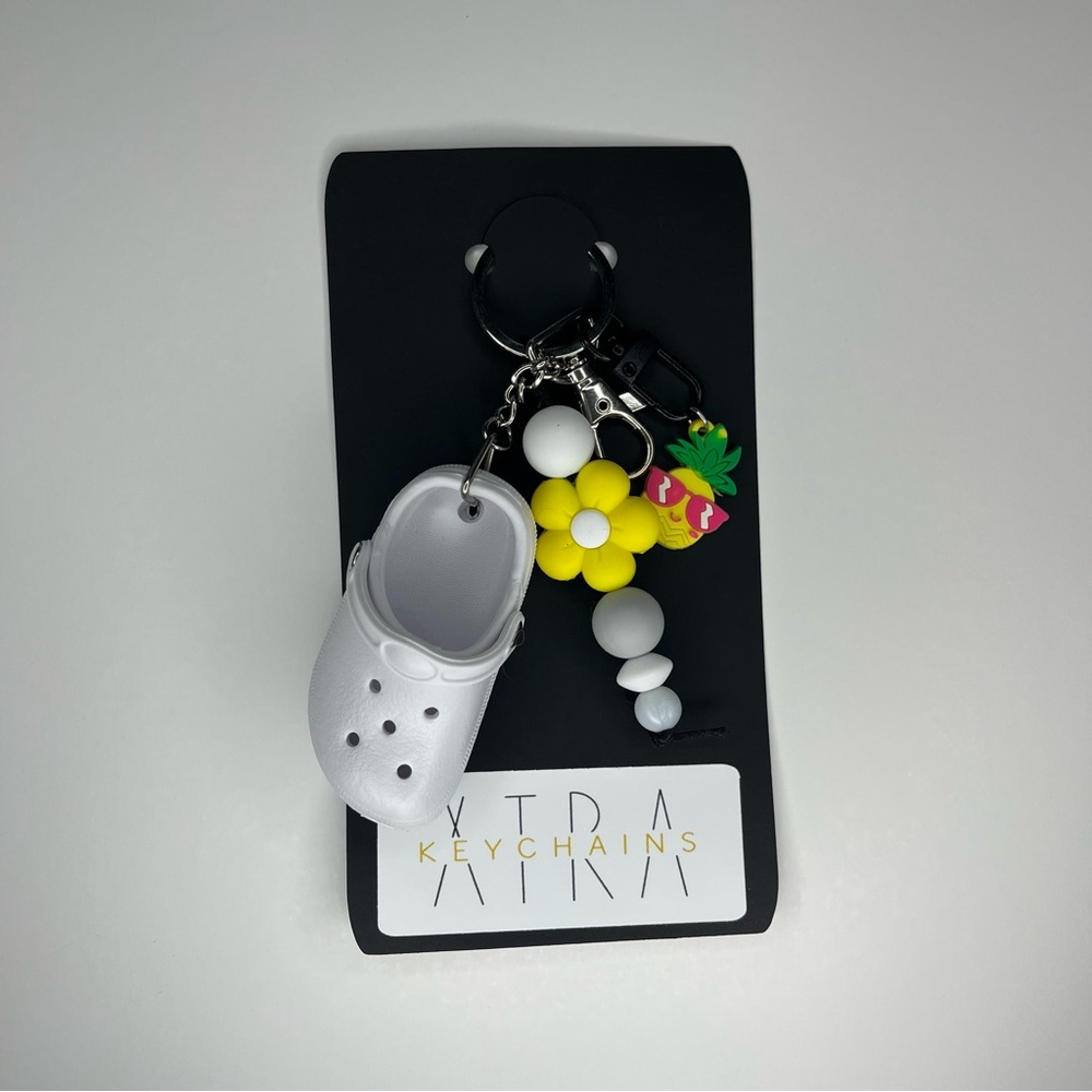 White Croc Keychain with Yellow and Pink Charms